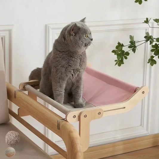 Hamac pour chat HammiePets à supports multiples, accroches pour fenêtre, capacité 18kg, confortable et sécurisé pour chat.